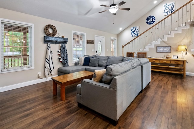 165 Kangaroo Ridge Rd, Byrdstown, TN 38549 - living area featuring stairs, a ceiling fan, vaulted ceiling, dark wood finished floors, and plenty of natural light