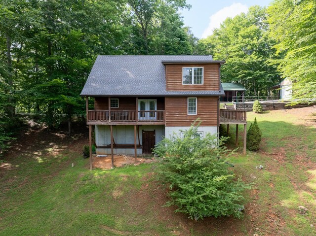 165 Kangaroo Ridge Rd, Byrdstown, TN 38549 - back of property featuring a wooden deck, a yard, and roof with shingles