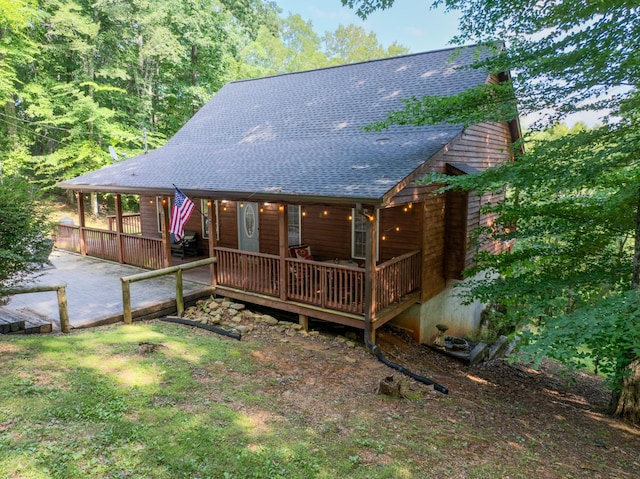 165 Kangaroo Ridge Rd, Byrdstown, TN 38549 - back of house featuring roof with shingles and a wooden deck