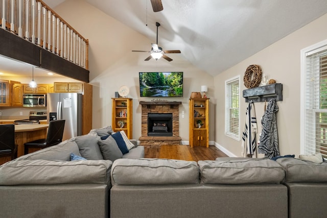 165 Kangaroo Ridge Rd, Byrdstown, TN 38549 - living area with ceiling fan, wood finished floors, vaulted ceiling, and a fireplace