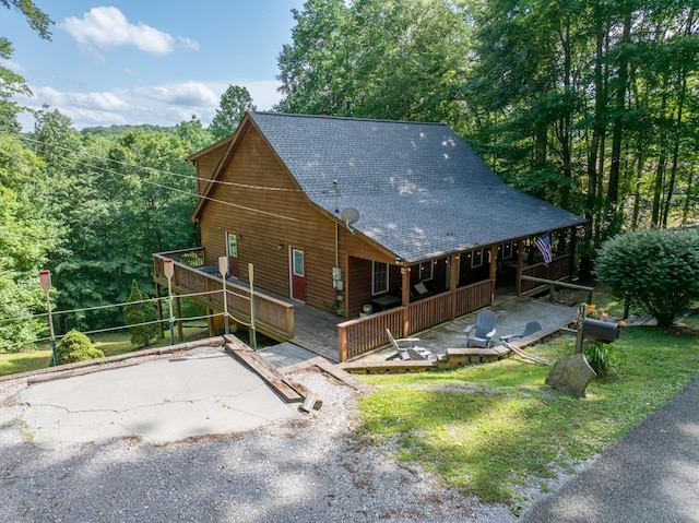 165 Kangaroo Ridge Rd, Byrdstown, TN 38549 - view of front of property featuring a shingled roof and a deck