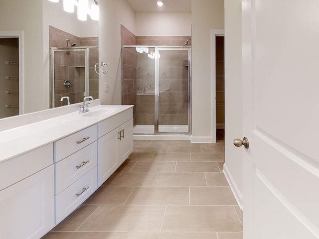 1334 Beasley Blvd, Mount Juliet, TN 37122 - full bathroom with vanity, a shower stall, tile patterned flooring, and a walk in closet