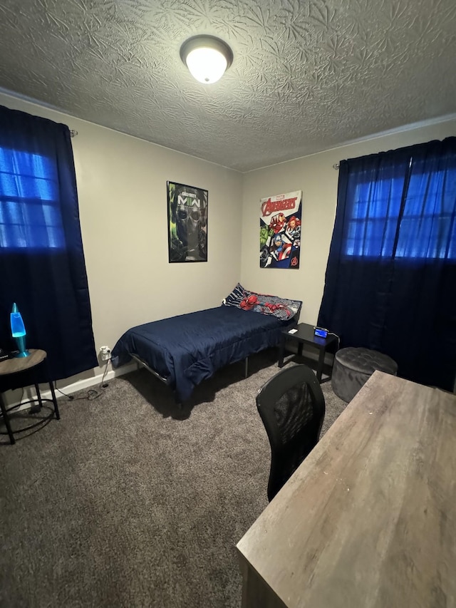 1304 Ellington Dr, Lafayette, TN 37083 - carpeted bedroom with a textured ceiling and baseboards