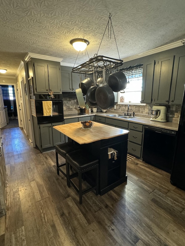 1304 Ellington Dr, Lafayette, TN 37083 - kitchen with black appliances, crown molding, dark wood-style floors, backsplash, and butcher block counters