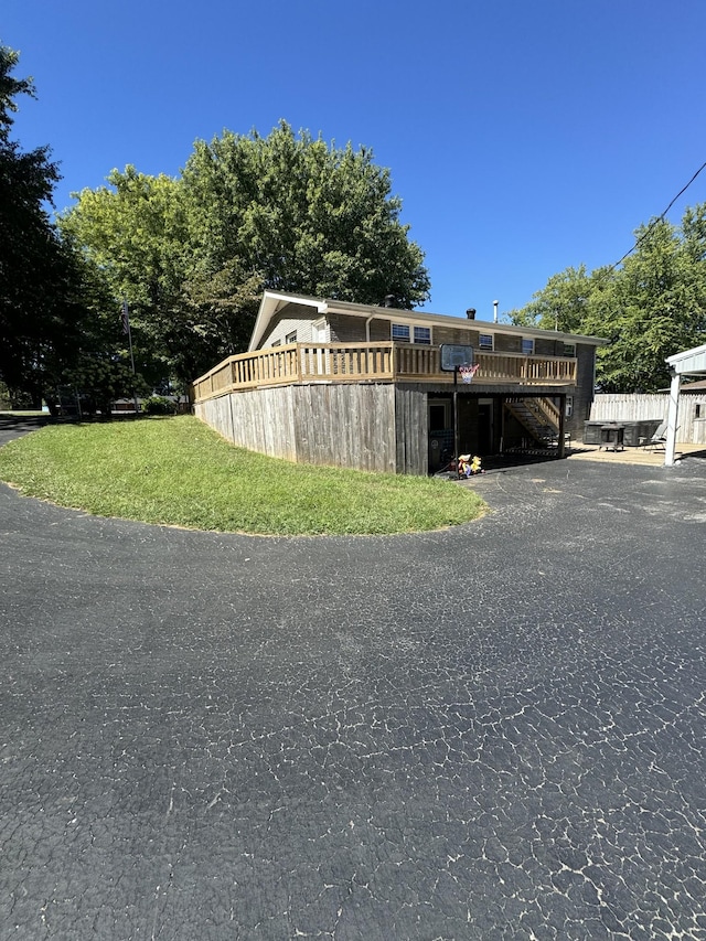 1304 Ellington Dr, Lafayette, TN 37083 - view of front of home with stairway and a wooden deck