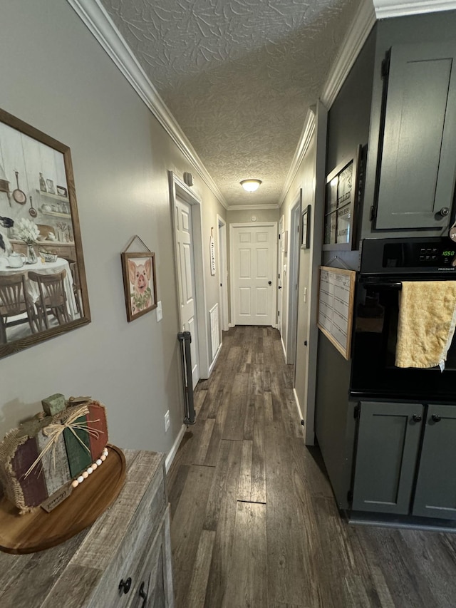 1304 Ellington Dr, Lafayette, TN 37083 - corridor featuring dark wood-style flooring, crown molding, and a textured ceiling