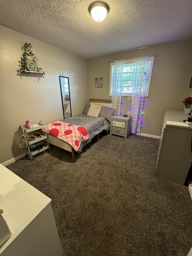 1304 Ellington Dr, Lafayette, TN 37083 - carpeted bedroom with a textured ceiling and baseboards