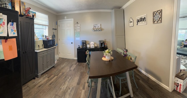 1304 Ellington Dr, Lafayette, TN 37083 - dining room featuring ornamental molding and wood finished floors
