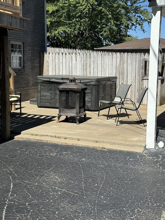 1304 Ellington Dr, Lafayette, TN 37083 - view of patio / terrace featuring a hot tub