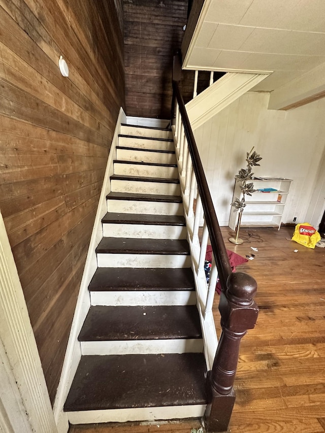 112 W Hackberry St, Centerville, TN 37033 - staircase featuring wood walls and wood finished floors