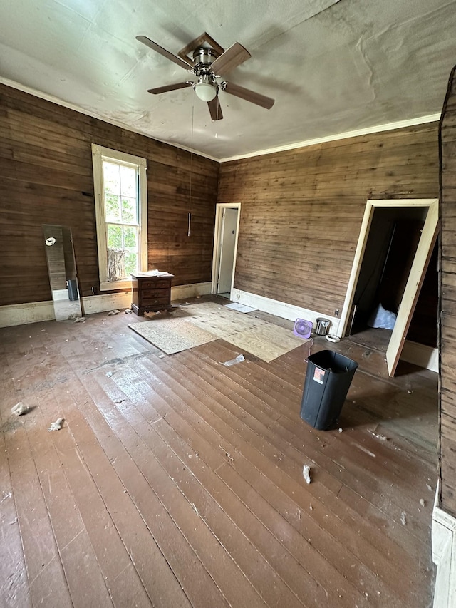 112 W Hackberry St, Centerville, TN 37033 - unfurnished room featuring a ceiling fan, hardwood / wood-style flooring, and wooden walls