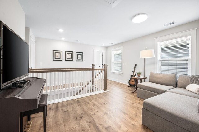 141 Foxhall Dr, Spring Hill, TN 37174 - living room featuring wood finished floors and recessed lighting