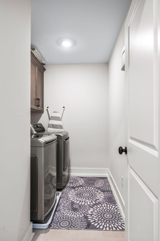 141 Foxhall Dr, Spring Hill, TN 37174 - laundry area featuring washer and clothes dryer and cabinet space