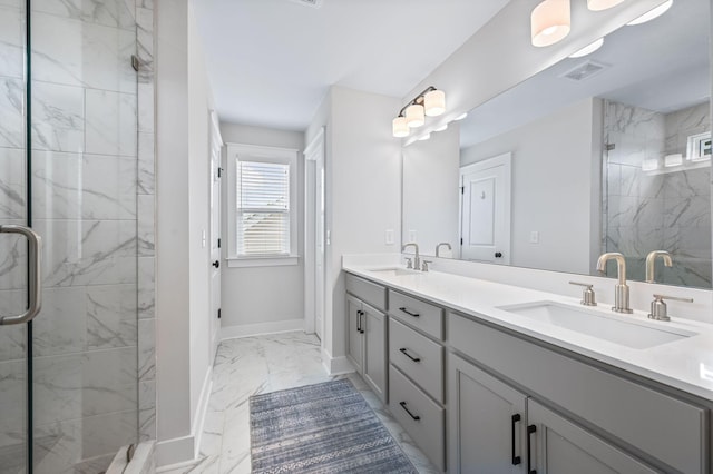 141 Foxhall Dr, Spring Hill, TN 37174 - bathroom featuring marble look tiles, double vanity, and a marble finish shower