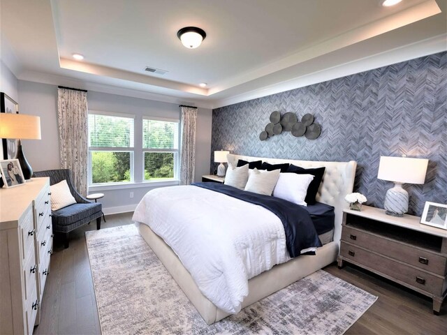 1332 Beasley Blvd, Mount Juliet, TN 37122 - bedroom with an accent wall, a raised ceiling, wallpapered walls, recessed lighting, and dark wood-style flooring