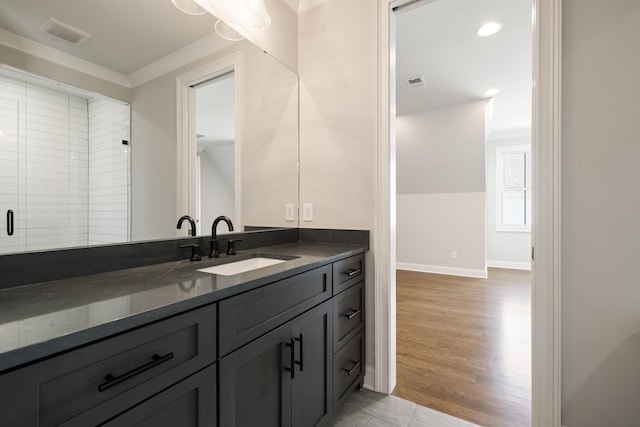 7521 Whiskey Rd, College Grove, TN 37046 - bathroom with vanity, a shower stall, wood finished floors, and recessed lighting