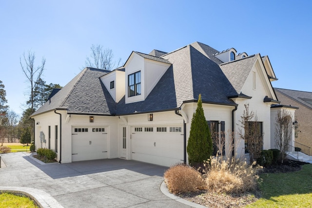 7521 Whiskey Rd, College Grove, TN 37046 - view of side of home with a garage, concrete driveway, and roof with shingles