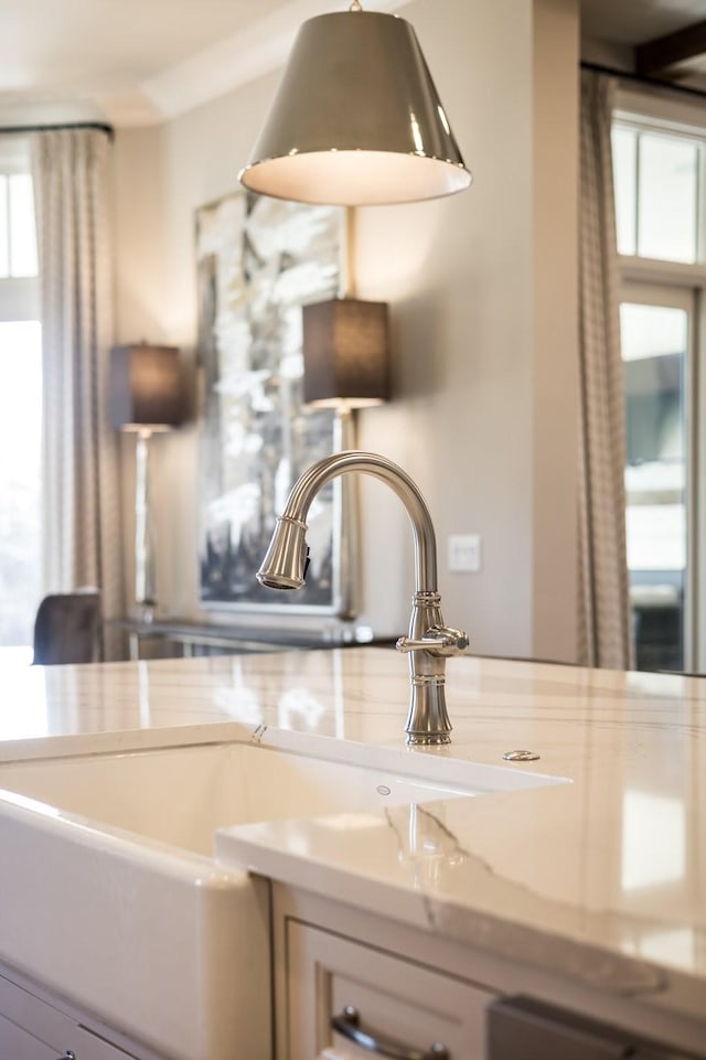 7521 Whiskey Rd, College Grove, TN 37046 - kitchen view of a sink and light stone countertops