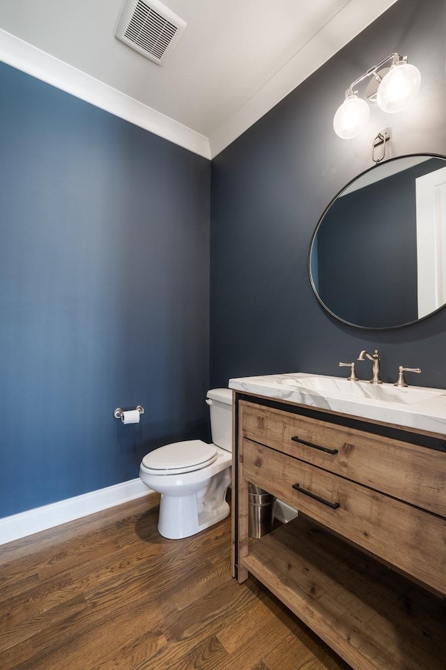 7521 Whiskey Rd, College Grove, TN 37046 - bathroom with vanity, wood finished floors, and ornamental molding