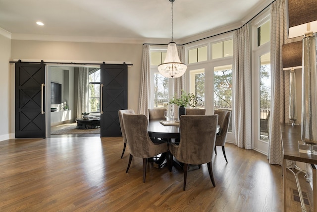 7521 Whiskey Rd, College Grove, TN 37046 - dining space featuring a barn door, plenty of natural light, wood finished floors, crown molding, and recessed lighting