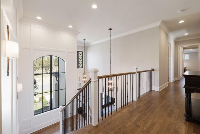7521 Whiskey Rd, College Grove, TN 37046 - corridor with a chandelier, wood finished floors, ornamental molding, recessed lighting, and an upstairs landing