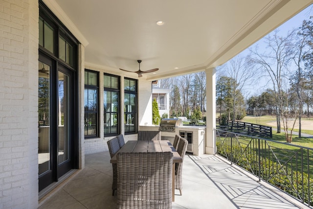 7521 Whiskey Rd, College Grove, TN 37046 - view of patio / terrace featuring exterior kitchen, a ceiling fan, and outdoor dining area