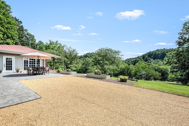 330 Cascade Hollow Rd, Normandy, TN 37360 - view of green lawn with a patio area and a wooded view