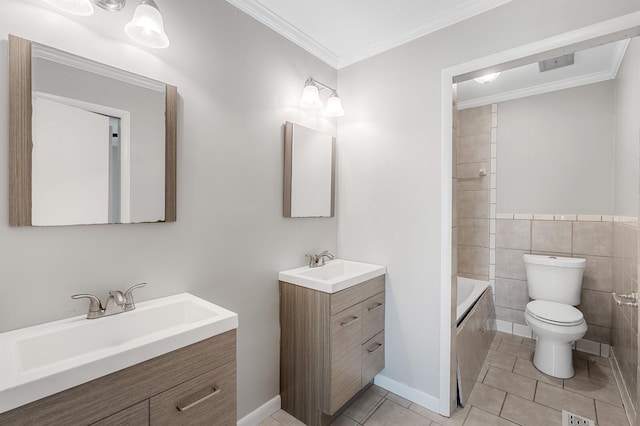 4052 Port Cleburne Ln, Hermitage, TN 37076 - full bath featuring vanity, tile patterned floors, crown molding, bathing tub / shower combination, and tile walls