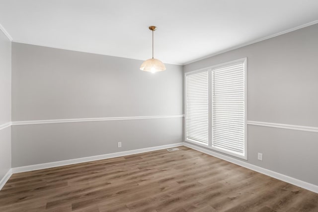 4052 Port Cleburne Ln, Hermitage, TN 37076 - empty room with wood finished floors and ornamental molding