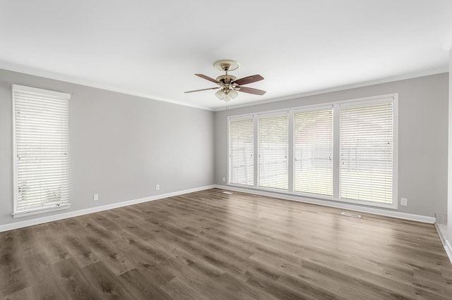 4052 Port Cleburne Ln, Hermitage, TN 37076 - unfurnished room featuring ornamental molding, plenty of natural light, a ceiling fan, and wood finished floors