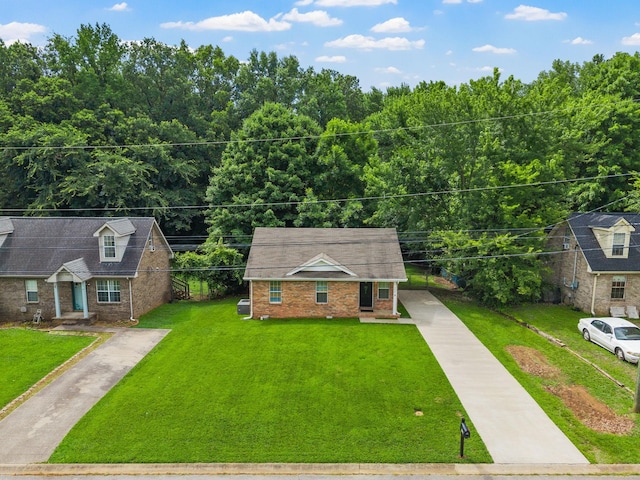 758 Spees Dr, Clarksville, TN 37042 - view of front of house featuring driveway, brick siding, and a front lawn