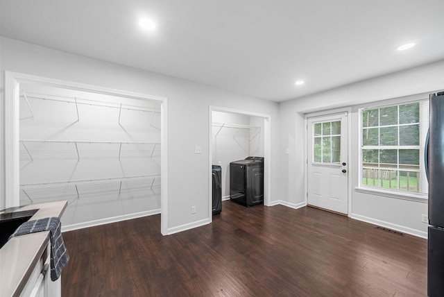 758 Spees Dr, Clarksville, TN 37042 - interior space featuring washer and dryer, dark wood-type flooring, and recessed lighting