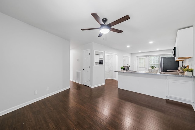 758 Spees Dr, Clarksville, TN 37042 - unfurnished living room featuring ceiling fan, dark wood finished floors, and recessed lighting