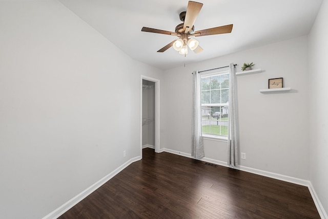 758 Spees Dr, Clarksville, TN 37042 - empty room with dark wood-style flooring and a ceiling fan