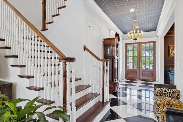 813 Stonewater Blvd, Franklin, TN 37064 - entrance foyer with a chandelier, stairs, crown molding, and french doors