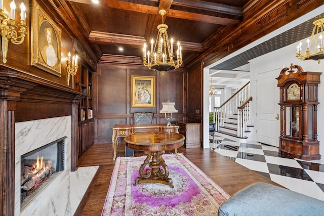 813 Stonewater Blvd, Franklin, TN 37064 - dining area featuring a chandelier, crown molding, a fireplace, stairway, and a wood ceiling with exposed beams