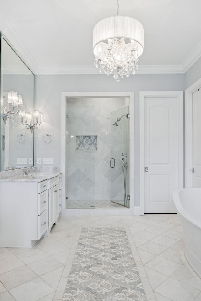 813 Stonewater Blvd, Franklin, TN 37064 - bathroom featuring a chandelier, crown molding, a shower stall, vanity, and a freestanding bath