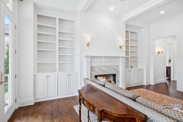 813 Stonewater Blvd, Franklin, TN 37064 - living room featuring built in features, dark wood-style flooring, crown molding, and recessed lighting