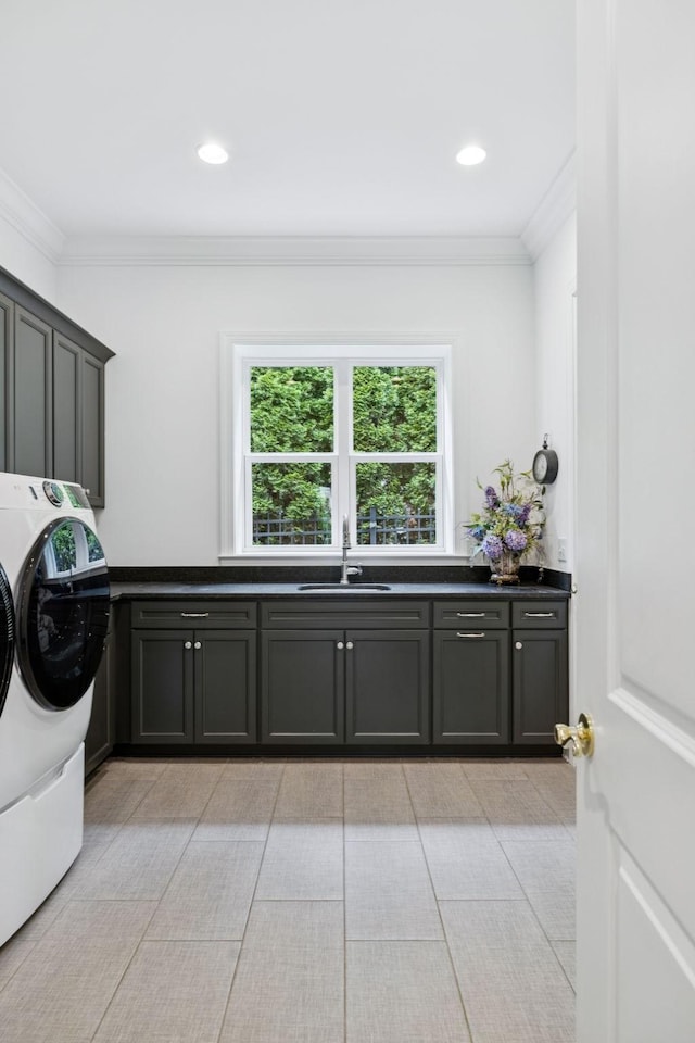813 Stonewater Blvd, Franklin, TN 37064 - washroom featuring cabinet space, ornamental molding, separate washer and dryer, and recessed lighting