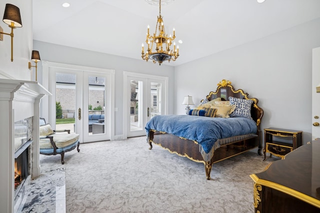 813 Stonewater Blvd, Franklin, TN 37064 - carpeted bedroom featuring a high end fireplace, french doors, access to exterior, and a chandelier