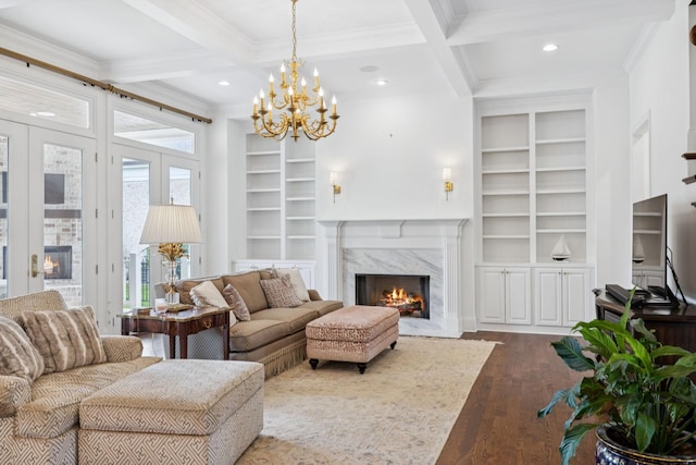 813 Stonewater Blvd, Franklin, TN 37064 - living area featuring a fireplace, coffered ceiling, built in shelves, dark wood-style floors, and beam ceiling