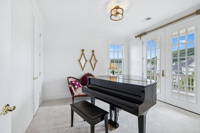 813 Stonewater Blvd, Franklin, TN 37064 - living area with light carpet, ornamental molding, and french doors