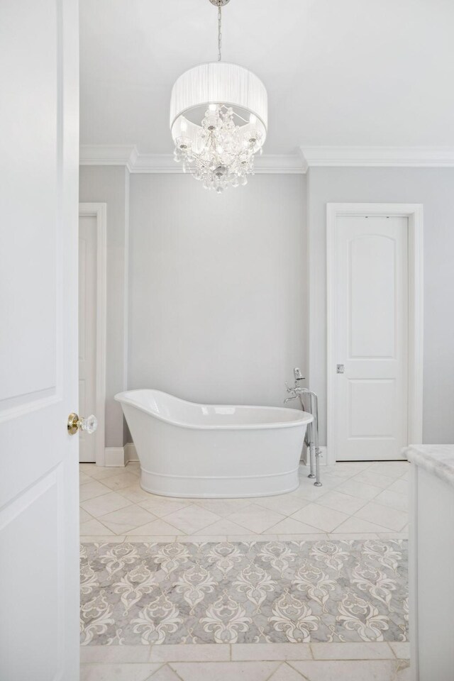 813 Stonewater Blvd, Franklin, TN 37064 - full bathroom with a chandelier, a soaking tub, crown molding, and tile patterned floors