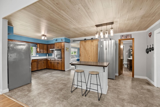779 Dogwood Dr, Erin, TN 37061 - kitchen featuring appliances with stainless steel finishes, a barn door, wooden ceiling, brown cabinetry, and a breakfast bar area