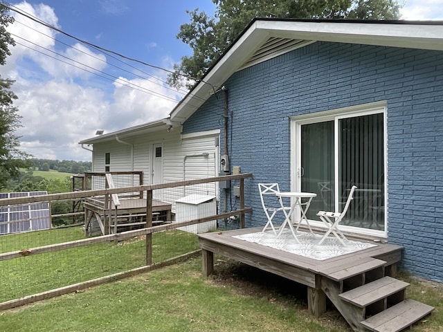 779 Dogwood Dr, Erin, TN 37061 - rear view of property with a deck and brick siding