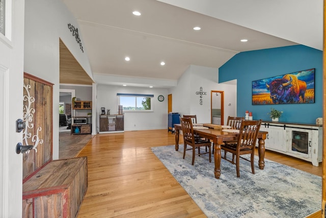 779 Dogwood Dr, Erin, TN 37061 - dining space with lofted ceiling, wood finished floors, and recessed lighting