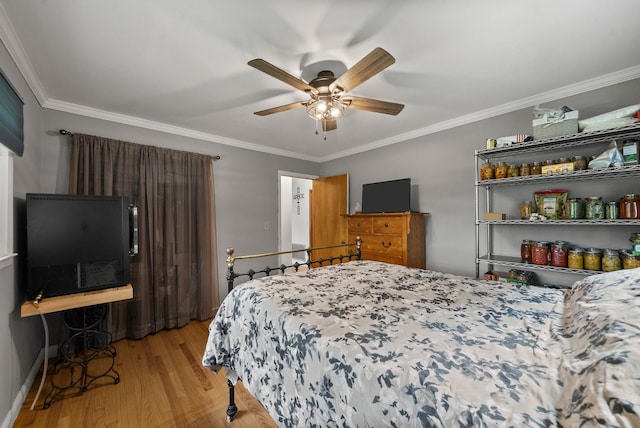 779 Dogwood Dr, Erin, TN 37061 - bedroom with light wood finished floors, ornamental molding, and ceiling fan