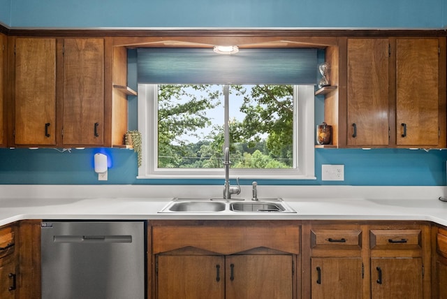 779 Dogwood Dr, Erin, TN 37061 - kitchen with dishwasher, brown cabinetry, light countertops, and healthy amount of natural light