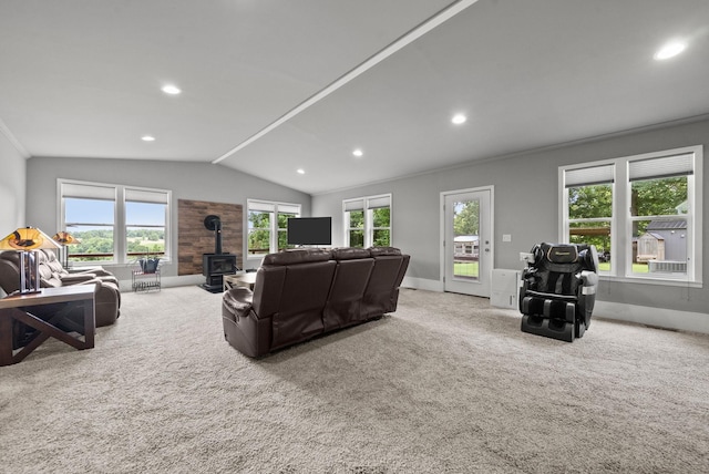 779 Dogwood Dr, Erin, TN 37061 - carpeted living room with a wood stove, lofted ceiling, and recessed lighting