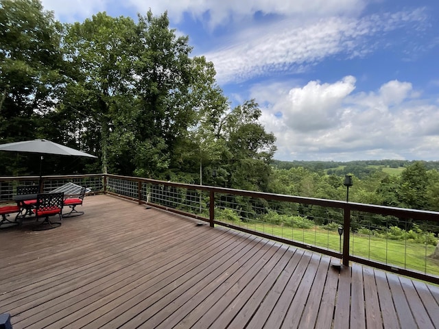 779 Dogwood Dr, Erin, TN 37061 - wooden deck featuring outdoor dining space